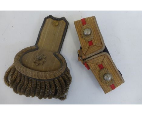 A Victorian gold coloured bullion wire Royal Navy epaulette or shoulder board with a gold coloured bullion wire Royal Marines