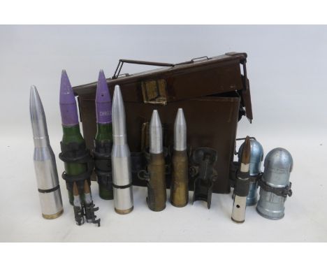 A British Army ammunition box containing large calibre Drill Rounds, Dummy Rounds and Inert Rounds.
