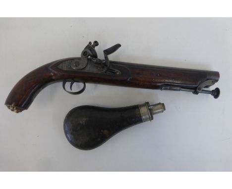 A Georgian flintlock pistol with lion's head mask to pommel and having a Tower proof mark with a G. & J.W. Hawksley leather c