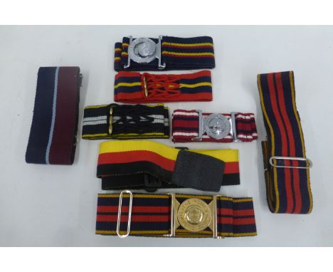Eight British Army stable belts.