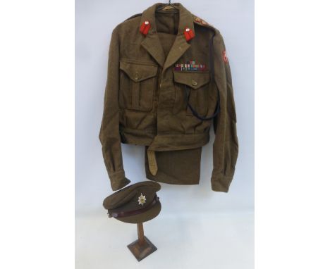 A 1953 pattern Notts & Derby Regiment army colonel's uniform (jacket, trousers and cap).