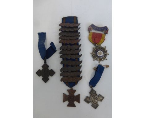 An 1893 and an 1889 Army Temperance Association medals with a Royal Naval Temperance Society medal and a J.M.C. D.S.O. medal 