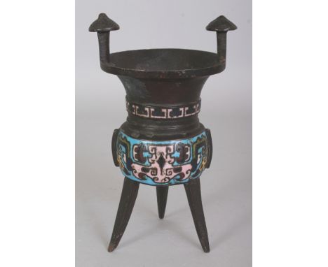 AN EARLY 20TH CENTURY JAPANESE JUE-FORM CHAMPLEVE TRIPOD CENSER, decorated in an archaic Chinese style, 7.1in high.