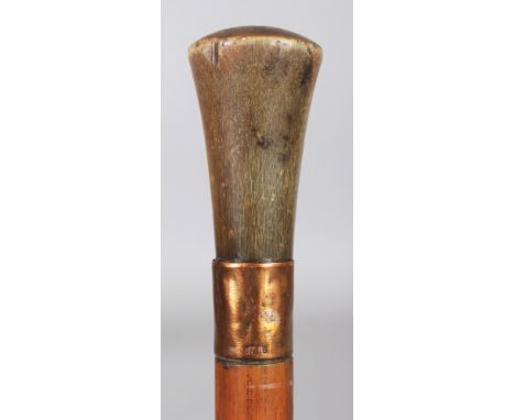 A HORN HANDLED BAMBOO WALKING STICK, with a copper collar impressed with a 'DOUBLE' mark, the horn handle possibly rhinoceros