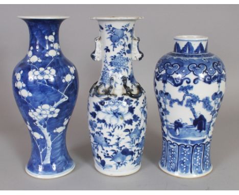 A GROUP OF THREE 19TH CENTURY CHINESE BLUE & WHITE PORCELAIN VASES, two bearing a four-character Kangxi mark, the tallest 10.