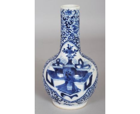 A SMALL 19TH CENTURY CHINESE BLUE & WHITE PORCELAIN BOTTLE VASE, the base with a four-character Kangxi mark, 6in high.