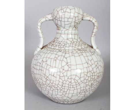 A CHINESE GE STYLE TWO-HANDLED CRACKLEGLAZE PORCELAIN VASE, the base with a Yongzheng seal mark, 9.7in high.