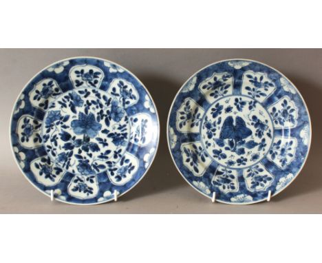 A PAIR OF CHINESE KANGXI PERIOD BLUE & WHITE SHIPWRECK PORCELAIN PLATES, circa 1700, each base with an artemisia leaf mark, 8