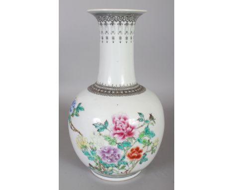 A 20TH CENTURY CHINESE FAMILLE ROSE PORCELAIN BOTTLE VASE, the neck interior with a fixed metal fitting, the base drilled thr