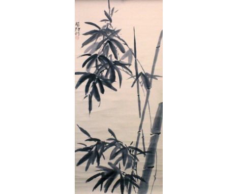 A SIGNED CHINESE HANGING SCROLL PAINTING ON PAPER, depicting bamboo, the painting itself approx. 36in x 16.8in.