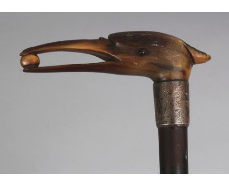 ANOTHER HORN HANDLED & WOOD WALKING STICK, with a hallmarked and engraved silver collar, the horn possibly rhinoceros horn, 3