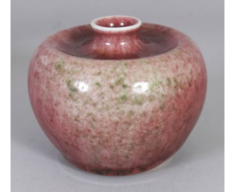 A CHINESE PEACH BLOOM PORCELAIN VASE, with a short waisted neck, the base with a Qianlong seal mark, 3.9in wide at widest poi