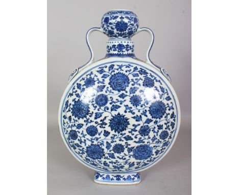 A LARGE GOOD QUALITY CHINESE MING STYLE BLUE & WHITE PORCELAIN MOON FLASK, each domed side decorated with formal scrolling lo