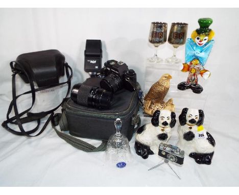 A good mixed lot to include a Praktica BX20 camera with a Prakticar Lens No.2169218 with flash, accessories and protective ca