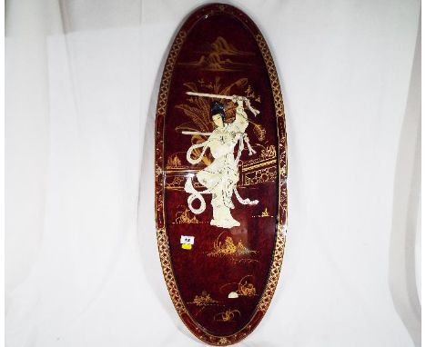 Asian Wall Art - a wall plaque depicting a Japanese lay set with mother of pearl and gilded highlights, 91cm (h) x 36cm (w)