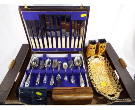 An oak cased canteen of cutlery and a pair of ceramic vases inscribed to the base 766077 with matching pedestal bowl, plated 