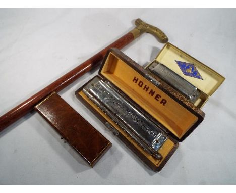 A Hohner 64 Chromonica four octave professional harmonica, and a further Chromonica harmonica, both cased - included in the l