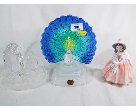 A Royal Doulton lady figurine entitled Lily HN1798, a sculptured Art Glass paperweight in the form of a peacock by Cristal d'