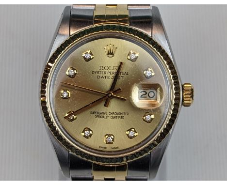 Rolex Oyster Perpetual Date Just Bimetal Chronometer with Diamond set numeral markers. 34mm case with jubilee bracelet in gre