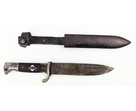 A GERMAN HITLER YOUTH DAGGER, the 5 1/4" blade stamped with maker's marks for Arthur Shuttlehoffer , with leather buff, steel