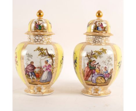 A pair of Dresden jars and covers, circa 1900, possibly Helena Wolfson, A R monogram, painted with figures in landscape on a 