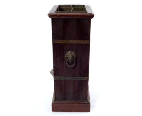 A mahogany stick stand, circa 1900, with reeded sides and brass bands, 63cm high