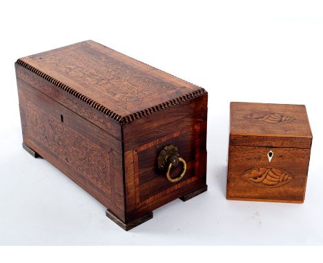 A Victorian marquetry inlaid tea caddy, enclosing two tea canisters and a mixing bowl, with ring handles to the sides, 30cm w