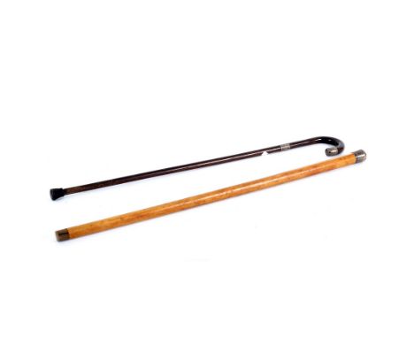 A malacca walking cane with plain silver knop, 91.5cm long and a rosewood walking stick with silver collar and terminal