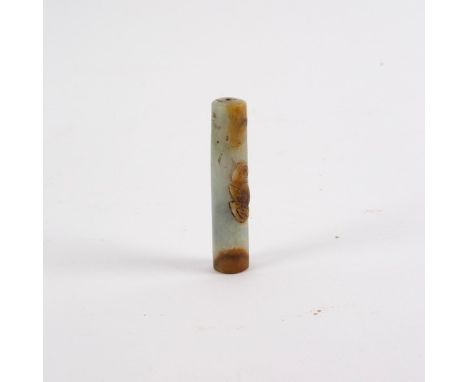 A Chinese mutton fat jade pen handle carved with a bat, 5.75cm long and a Chinese spinach jade pencil and a needle