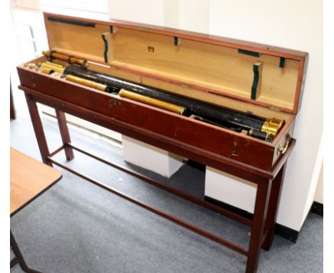 A telescope and stand by Broadhurst Clarkson &amp; Co, in a stained pine case on stand CONDITION REPORT: The stained pine cas