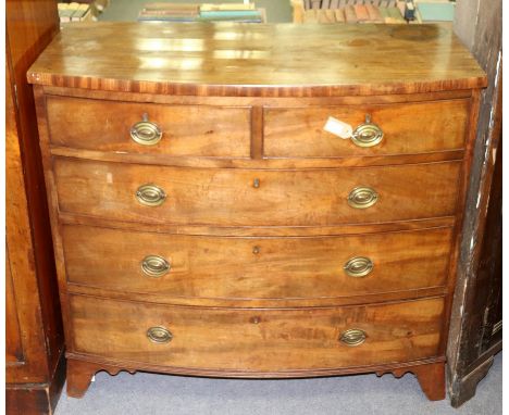 A George III bowfront chest, circa 1800, of two short and three long drawers, on splayed bracket feet, 101.5cm x 114.25cm