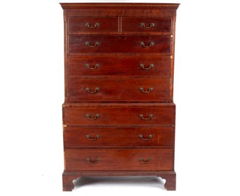 A George III mahogany tallboy chest, circa 1780, the moulded and chequered cornice above two short and six long drawers, on b