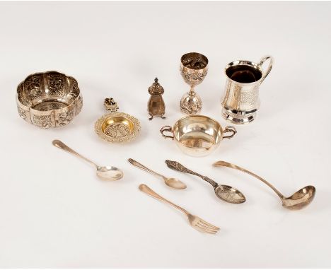A Victorian silver Christening mug, 10cm high, a George III sauce ladle, a small silver two-handled dish and sundry flatware,