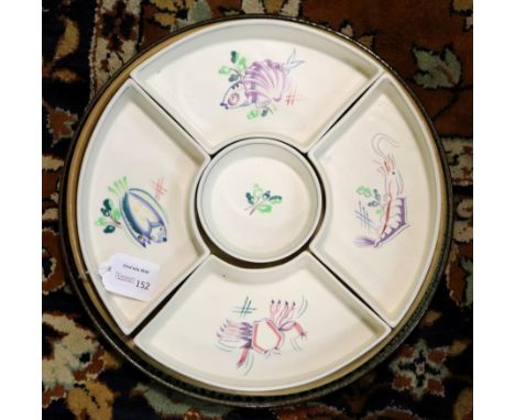 A Poole pottery hors d'oeuvres dish of five pieces, painted fish on a turned wood tray, 30cm diameter and a brown glazed pott