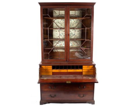 A George III mahogany secretaire bookcase, circa 1780, the moulded cornice above two astragal glazed doors, the lower section