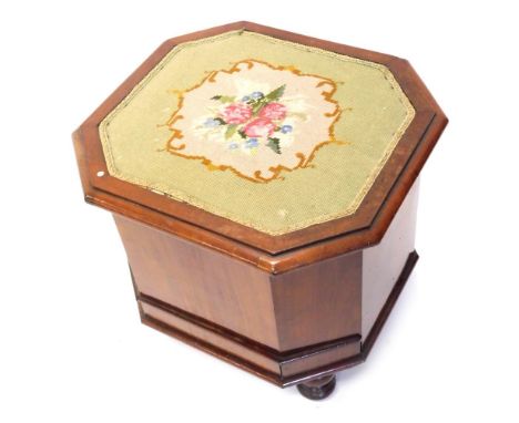 An early 20thC petit point box commode, the octagonal top with fitted interior, on turned feet, 47cm high, 47cm wide, 43cm de