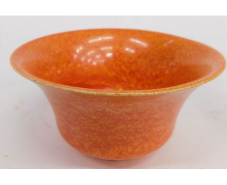 An early 20thC Royal Lancastrian orange pottery bowl, in the manner of Radford, vibrantly decorated with speckle glaze, impre