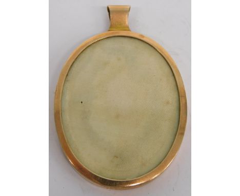 An oval portrait miniature frame, the plain surround marked AW9C, 6cm high. 