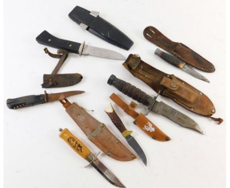 A hunting dagger, with razor edge blade, turned handle and compressed pommel, in belt scabbard, 24cm high, various other dagg