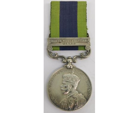 A George V India medal, marked 10940 SEPDY AHMAD KHAN. 2-2 PUNJAB R, the ribbon with north west frontier 1935 clasp. 