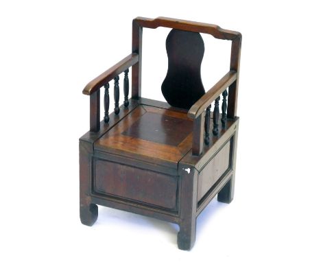 A Chinese hardwood child's commode chair.
