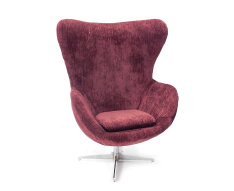 A vintage chrome framed swivel chair, After Arne Jacobsen with deep seat and high back, in textured purple material, on X sha