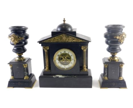 An associated late 19thC French clock garniture, comprising portico shaped clock with dome, cast brass frieze and two pillars