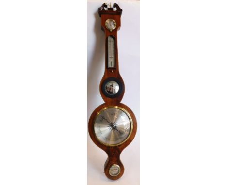 A 19thC mahogany and boxwood strung wheel barometer, with swan neck pediment and silvered dials, the mirror with ebonised ree