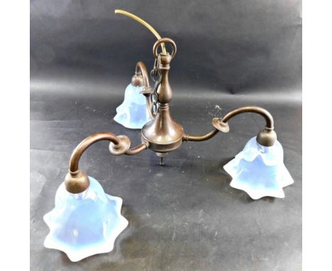 An Art Nouveau three branch chandelier, with vaseline glass shades, 31cm high. 