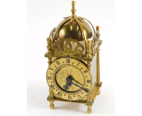 A 20thC Smiths Clocks and Watches brass miniature lantern clock, with bell top, 8cm diameter Roman numeric chapter ring, sten