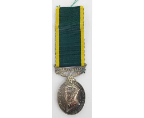 A George VI Territorial medal for Efficient Service, marked 6015363 PTE L M MALLET DORSET. 