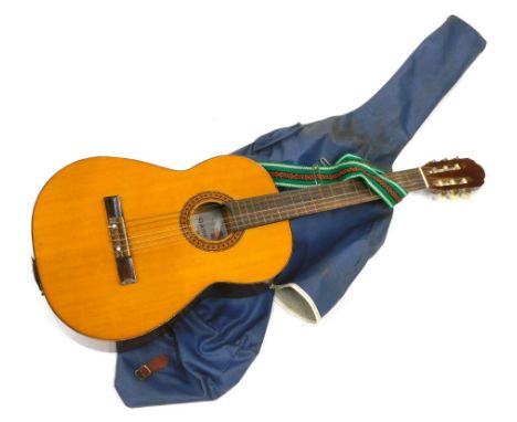 A Peerless Classic model 3052 Japanese acoustic guitar, in outer case. 