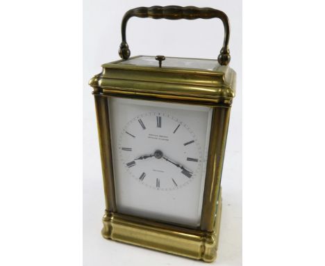 A 20thC brass repeating carriage clock, the 6cm wide back plate stencilled with a Roman numeric dial, marked Edward Bright Pa