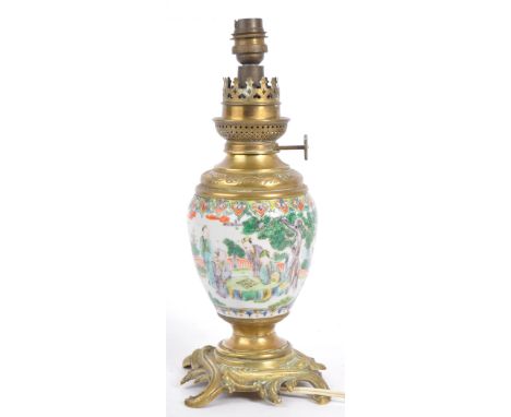 A 19th century Chinese ginger jar converted rocaille style lamp. The jar featuring figural scenes of daily life, with a repea